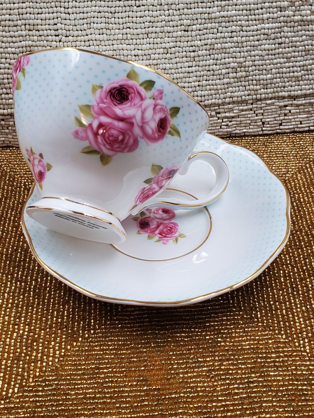 Beautiful bone china pink rose and polka dot teacup and saucer set by Coastline